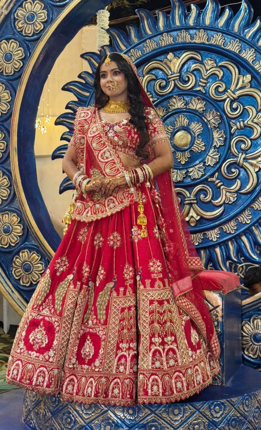 The Bride in Traditional Red Lehenga